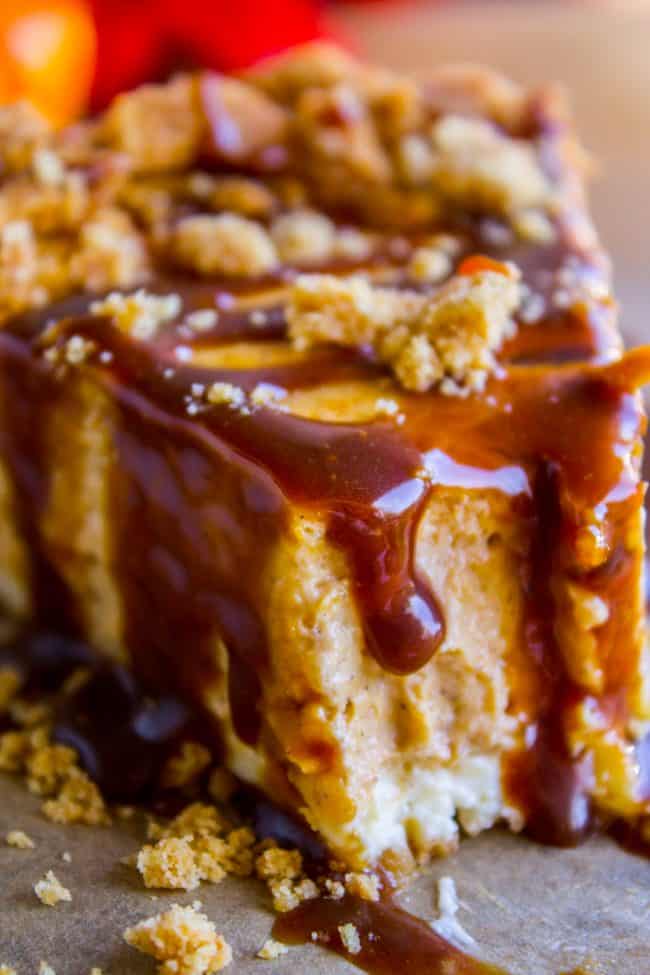 pumpkin cheesecake with a bite taken out of the front.