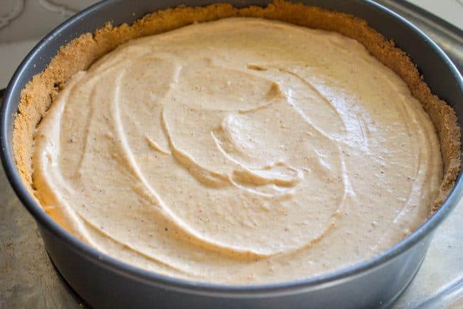 adding a pumpkin layer to cheesecake.
