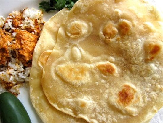 old photo of roti with chicken tikka masala.