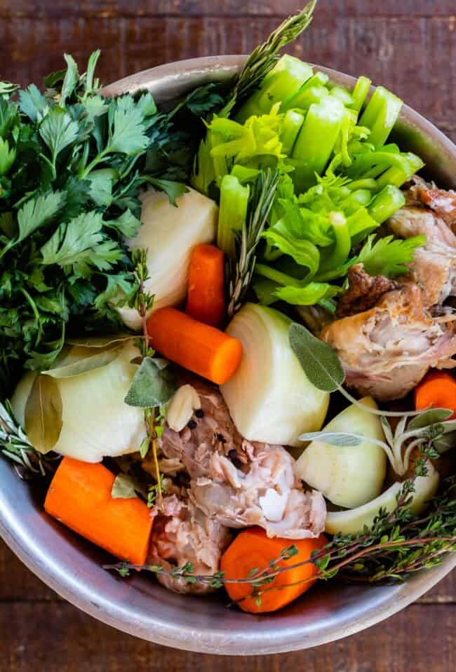 vegetables in stock pot for turkey stock recipe.
