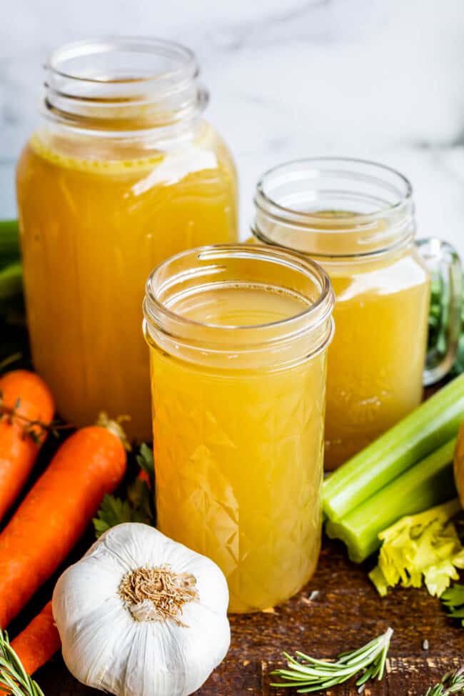 Turkey broth in three different Mason jars.