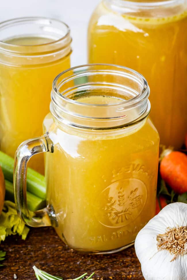 turkey stock inside 3 Mason jars.