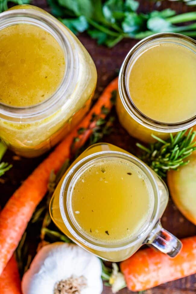 turkey stock recipe showing stock inside Mason jars, top view.