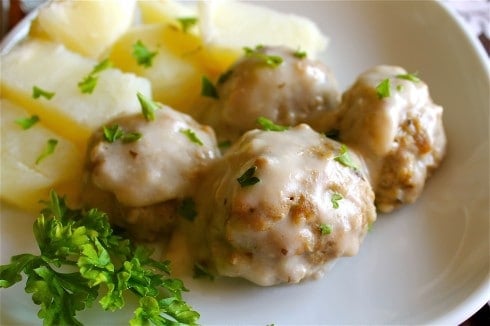 Easy Swedish Meatballs Recipe from The Food Charlatan. This Easy Swedish Meatballs Recipe is a traditional meal for our family on Christmas Eve. The flavors are divine and it comes together easy and can even be done in the crockpot. It's Eric's great grandmother's recipe so you know it's authentic and has survived generations! #swedish #meatballs #easy #christmaseve #creamofmushroom #crockpot #traditional Swedish Meatball Recipe Crockpot