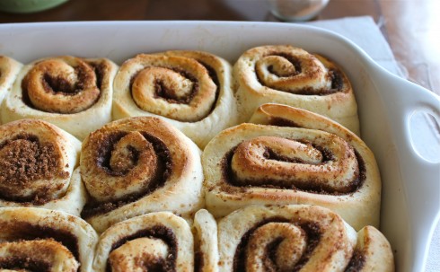 a pan of baked cinnamon rolls without the glazed topping. 
