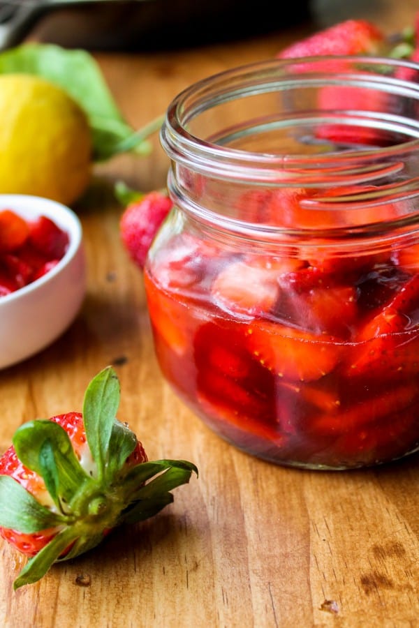 Fresh Strawberry sauce in an open jar.