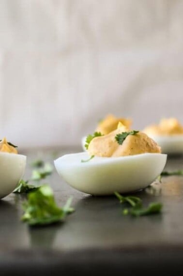 Sriracha Deviled Eggs from The Food Charlatan
