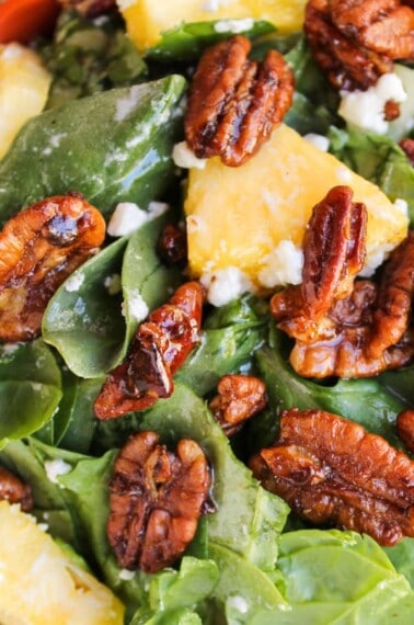 Pineapple Spinach Salad | TheFoodCharlatan.com This twist on the Strawberry Spinach Salad is easy and bright-tasting!