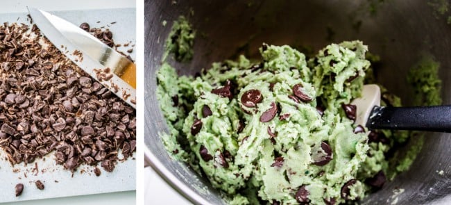 Mint Chocolate Chip Cookies from The Food Charlatan. These Mint Chocolate Chip Cookies are like eating the ice cream in the form of a warm, buttery, gooey cookie. They're crisp on the edges while perfectly tender and chewy in the center. #mint #chocolate #chip #cookies #peppermint #chocolatechip #gooey #chewy #easy #recipe #crisp Chopping up dark chocolate chips for dough