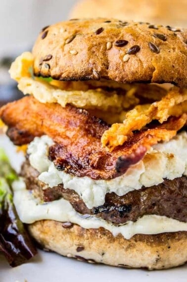 Bacon and Goat Cheese Aioli Burger with Crispy Onions from The Food Chatrlatan