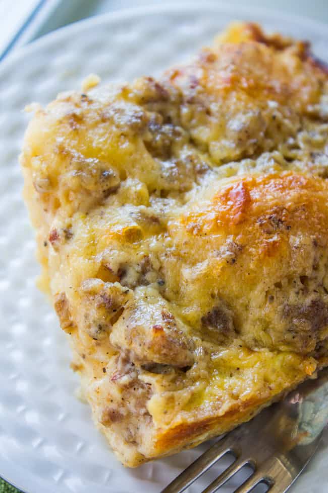 Overnight Biscuits and Gravy Casserole from The Food Charlatan. A quick and easy Biscuits and Gravy Casserole that you can make the night before! Just throw it in the oven in the morning. Use canned biscuits but homemade gravy. It is perfect for Christmas breakfast! #biscuits #gravy #breakfast #casserole #easy #overnight #makeahead #eggs #homemade biscuit and gravy breakfast casserole.
