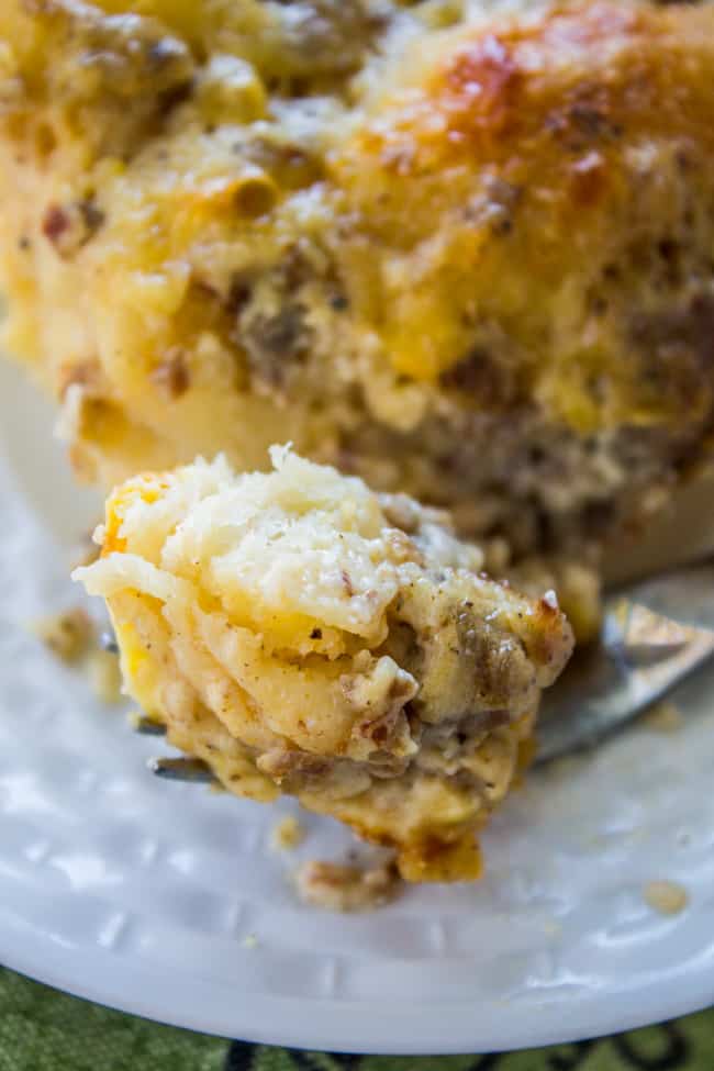 Overnight Biscuits and Gravy Casserole from The Food Charlatan. A quick and easy Biscuits and Gravy Casserole that you can make the night before! Just throw it in the oven in the morning. Use canned biscuits but homemade gravy. It is perfect for Christmas breakfast! #biscuits #gravy #breakfast #casserole #easy #overnight #makeahead #eggs #homemade biscuit and gravy breakfast casserole.