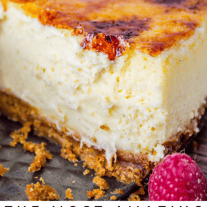 A close-up of a creamy creme brulee cheesecake with a caramelized topping, graham cracker crust, and fresh raspberries on the side. Text below reads: The Most Amazing Cheesecake with Crème Brulee Topping.
