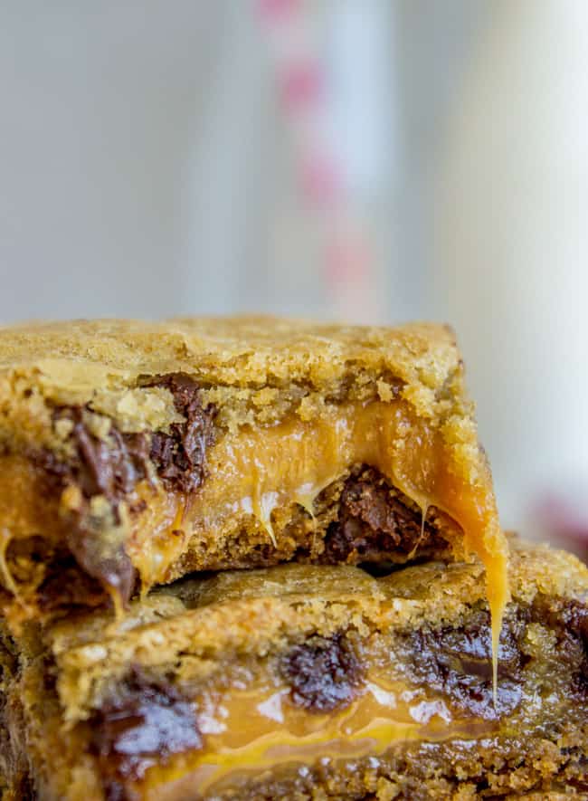 a stack of gooey carmelitas bars.