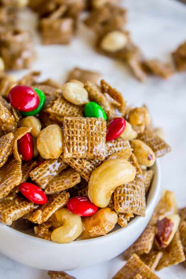 sweet and salty chex mix recipe showing a mix of chex, M&M's and nuts glazed with sugar.