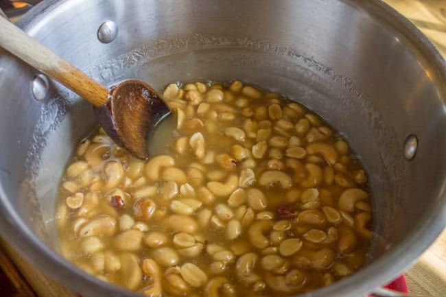 Peanuts floating in glaze.