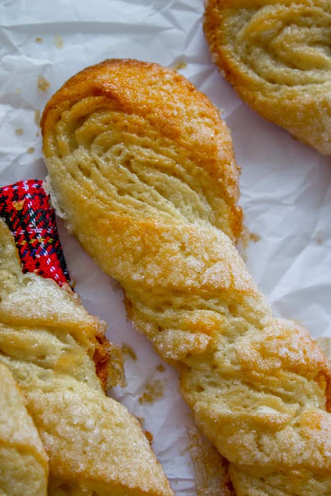 a full shot of a Swedish sour cream twist cookie.
