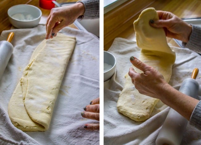 dough being folded into a log. 