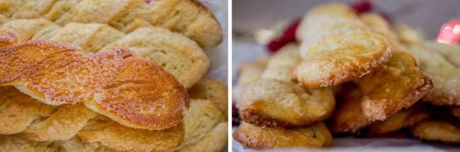 Baked sour cream twist cookies in a pile, showing the toasted bottoms. 