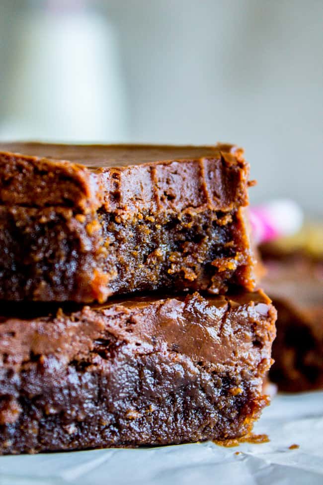 stack of frosted fudge brownies.