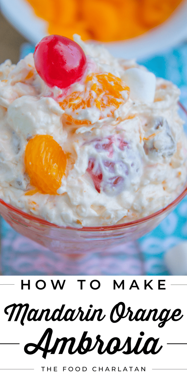 mandarin orange ambrosia salad in a pink glass dish.