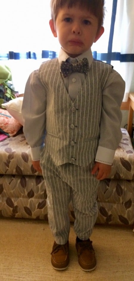 child in a suit. 