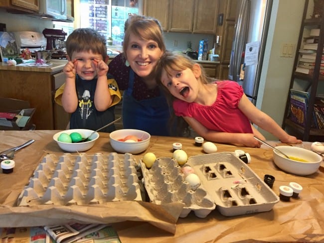 easter egg dying with two kids and a mom. 