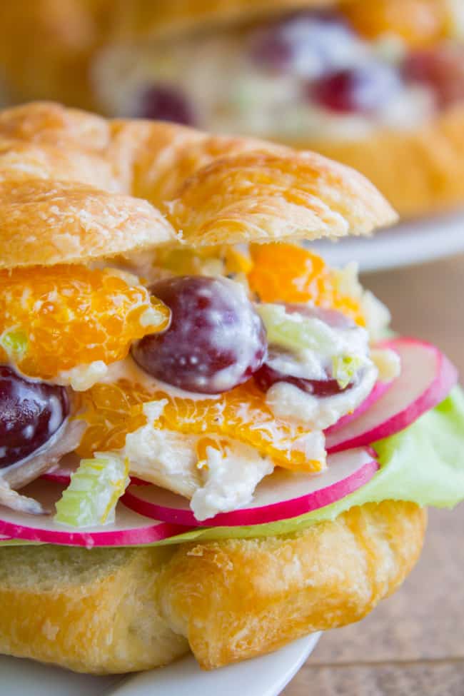 Chicken salad with Mandarin oranges on a croissant.