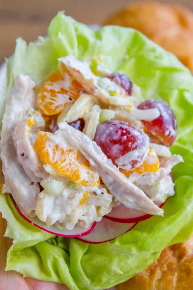 chicken salad with grapes and oranges in lettuce wraps.
