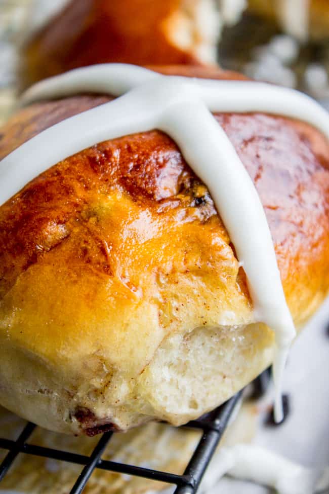 a hot cross bun with an icing cross shot from close up. 