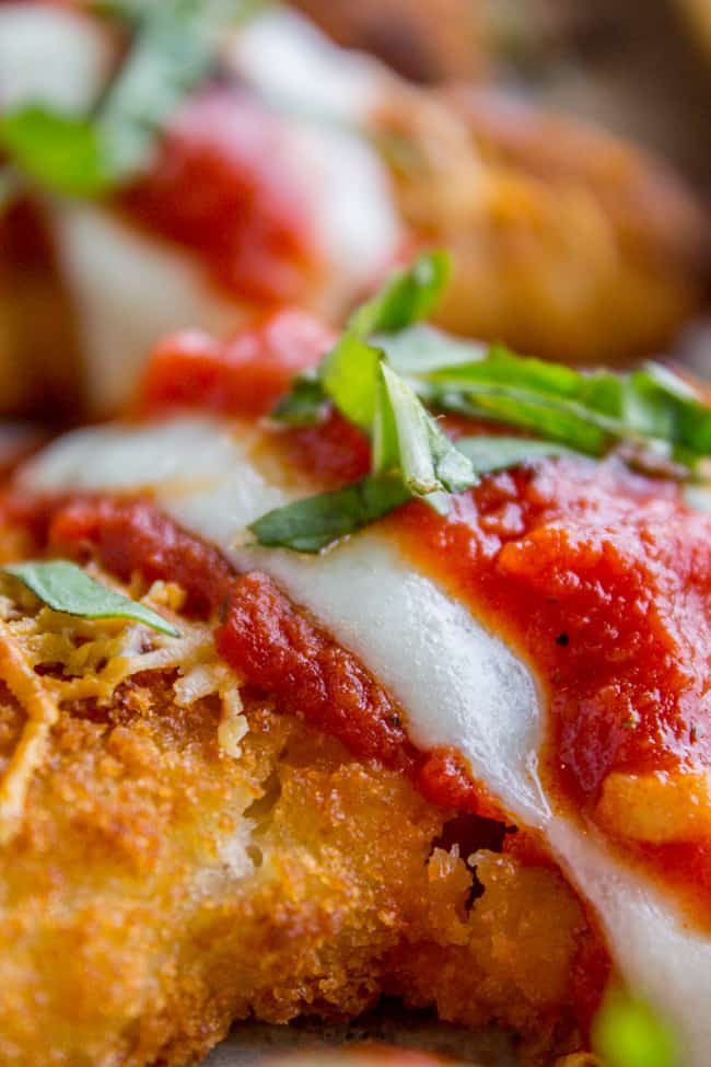 Baked fish stick topped with mozzarella, tomato sauce and basil. 