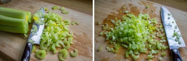 finely diced celery on a cutting board with a knife.