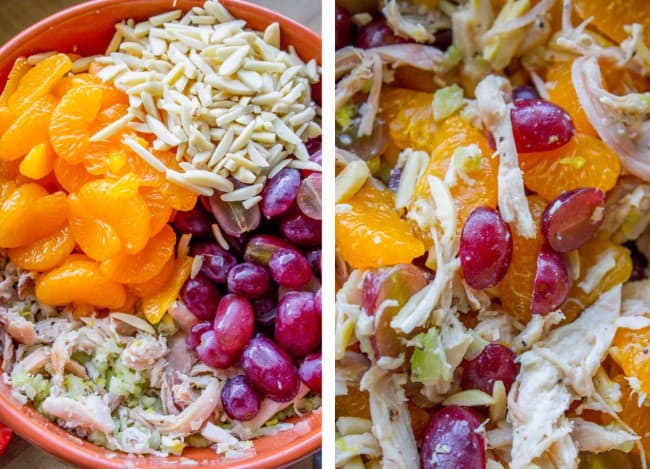 chicken salad in large bowl with almonds, oranges, and grapes.