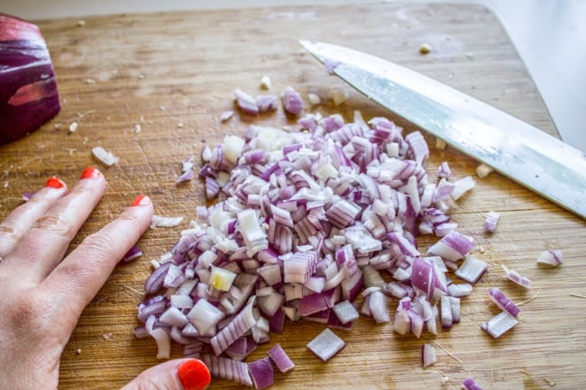 Dicing onions for the dip. 
