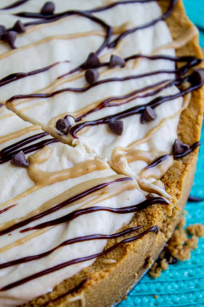 frozen peanut butter pie with hot fudge and chocolate chips on top.