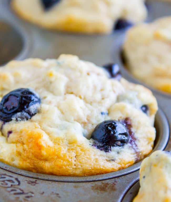Blueberry Buttermilk Pancake Muffins in a muffin tin.