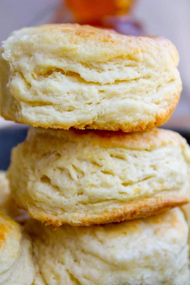 homemade Flaky Biscuits stacked on each other.