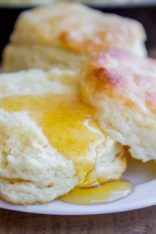 Flaky buttermilk biscuits with honey.