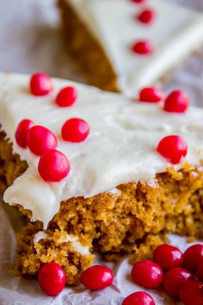Paul's Pumpkin Bars with Cream Cheese Frosting topped with red hot candies.