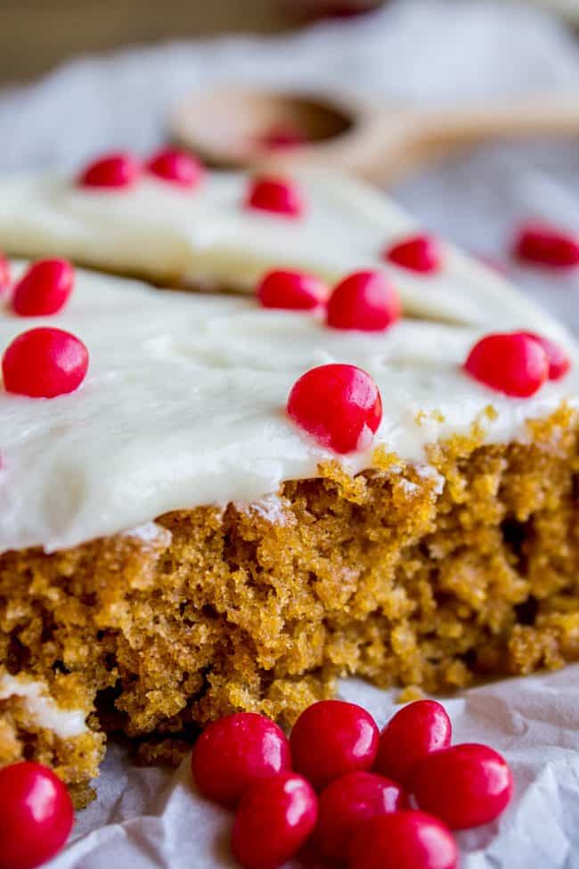 Pumpkin bar with frosting and red hots.