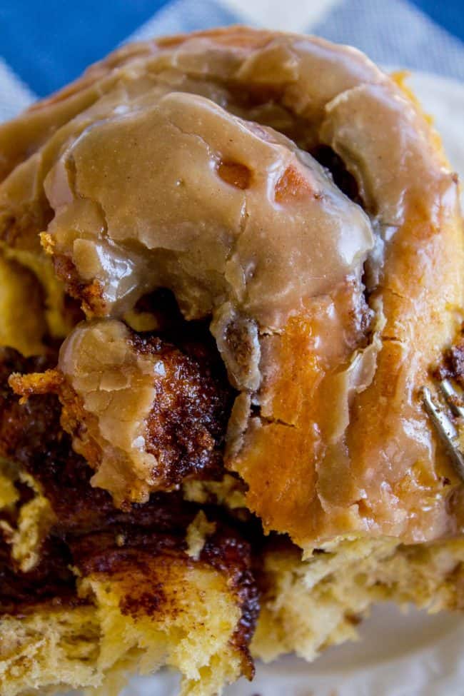 pumpkin cinnamon rolls with icing.