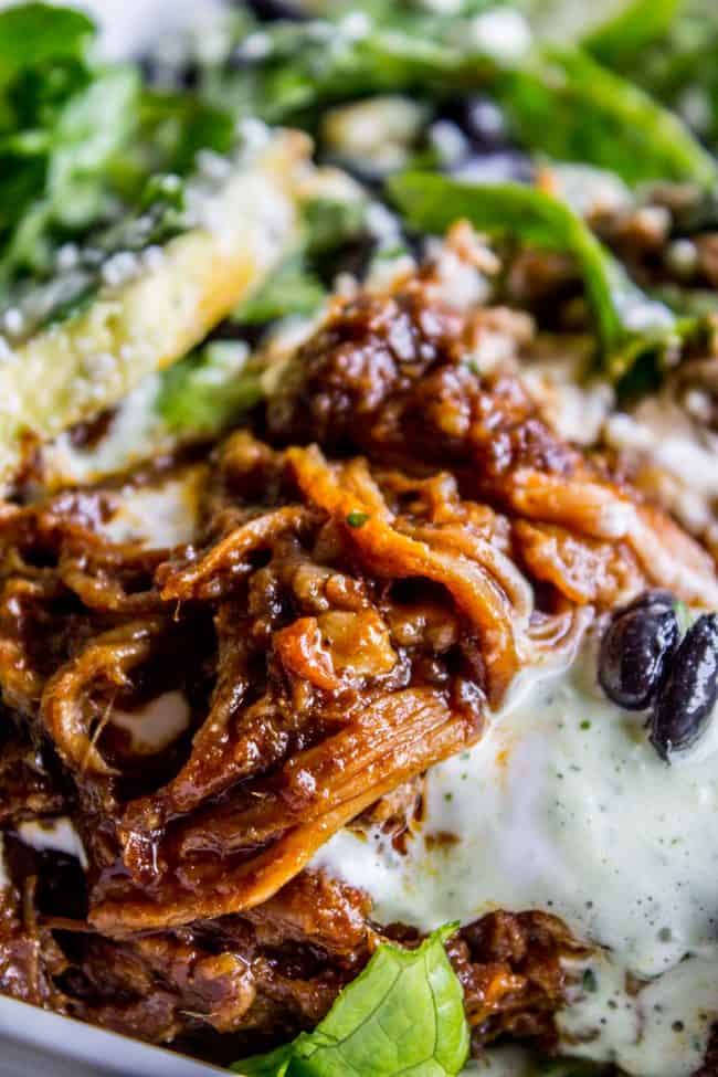burrito with shredded pork and cilantro ranch dressing. 