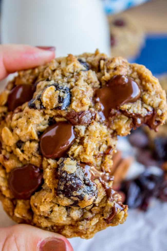 Dark Chocolate Cherry Oatmeal Cookies with a bite removed. 