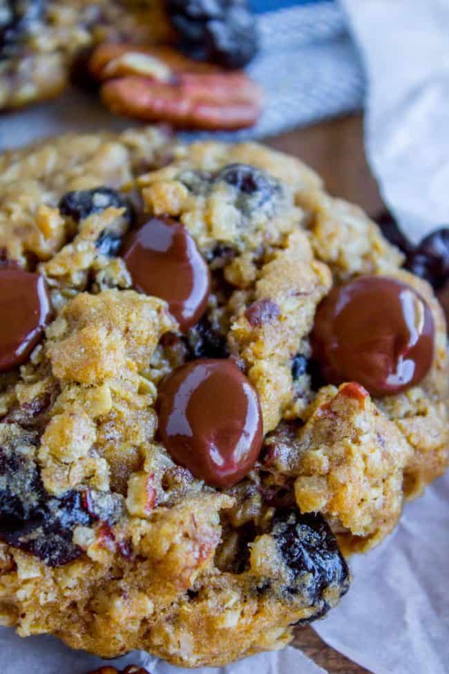 Dark Chocolate Cherry Oatmeal Cookies  with napkins in the background. 