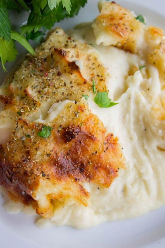 close up of cheesy, make-ahead mashed potatoes.