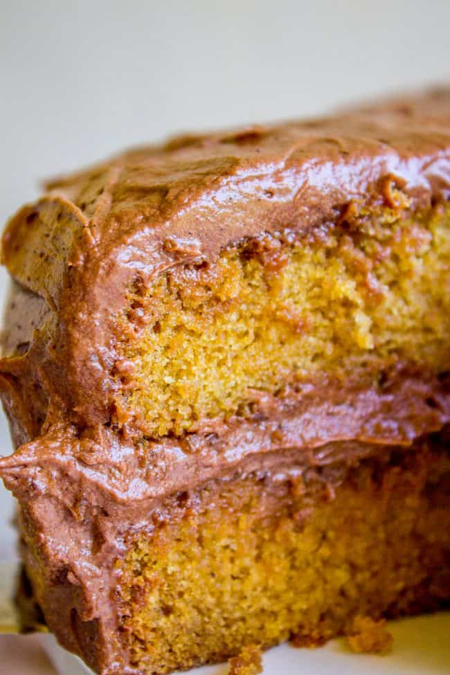 Brown Sugar Yellow Cake with Chocolate Frosting from The Food Charlatan. The BEST moist yellow cake recipe I've ever had, probably because there is one unusual ingredient: brown sugar. It makes the cake less traditional but a lot more MOIST. (Hallelujah!) I'm in love with this brown sugar yellow cake and the ridiculous amount of chocolate frosting that goes with it. #cake #yellowcake #frosting #chocolatefrosting #homemade #recipe #fromscratch #moist #withchocolatefrosting #easy #icing #dessert #layer #layercake #birthday #birthdaycake brown sugar yellow cake