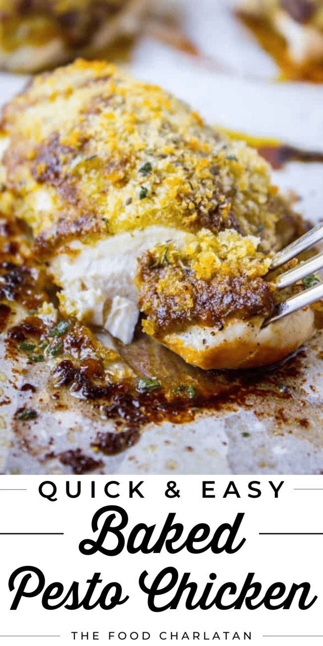 baked pesto chicken with a fork removing a bite.