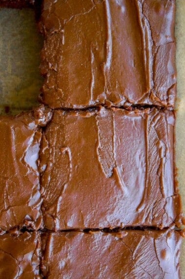 Close up of two slices of chocolate Texas sheet cake