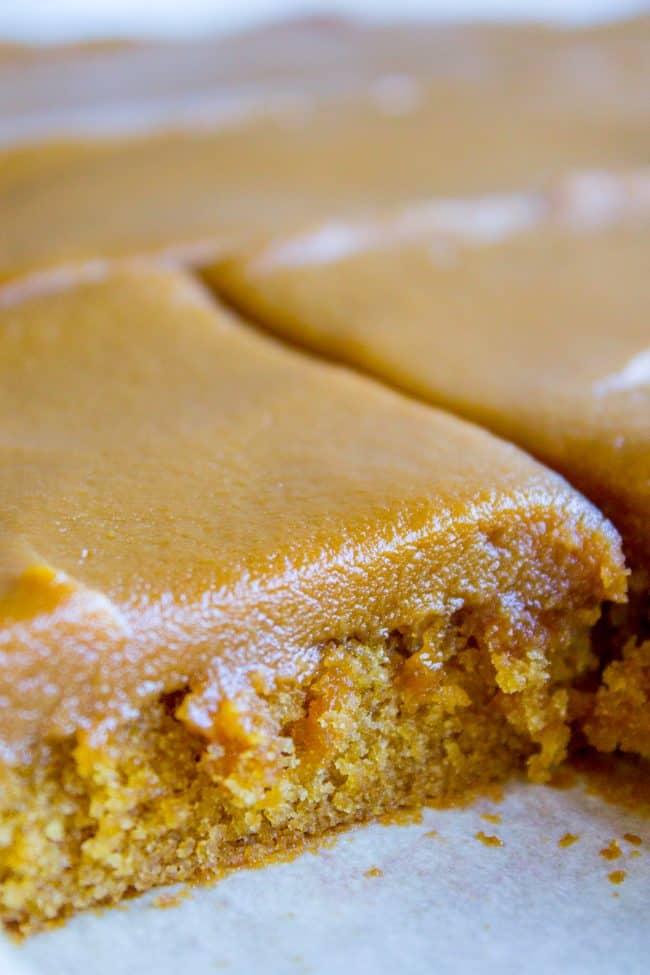 Caramel Cake with Caramel Icing Recipe from The Food Charlatan. Have you ever made a Caramel Cake with Caramel Icing recipe? It's a classic Southern treat! But instead of a layer cake, I made it into a thin sheet cake. Less time baking, more time eating, I say! It's really easy to put together. #southern #icing #recipe #caramel #frosting #cake #sheetcake #oldfashioned #easy #homemade caramel cake sliced into squares