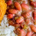 Red Beans on top of white rice with fried chicken